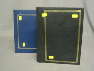 A black album containing various greetings cards together with a blue album of greetings and Valentine cards