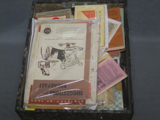 A filing box containing a collection of various ephemera