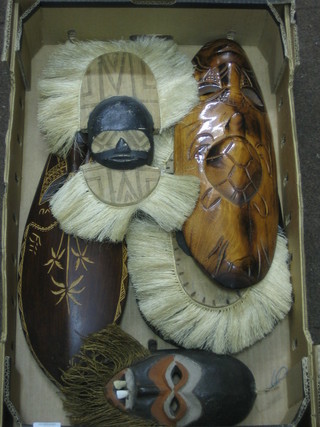 6 various Eastern carved masks