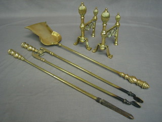 A Victorian 3 piece brass fireside companion set comprising shovel, tongs and poker, together with a pair of matching fire dogs
