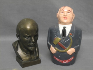 A Soviet pressed metal bust of Lenin  5 1/2" together with a plaster figure money box in the form of Gorbachev 8" 