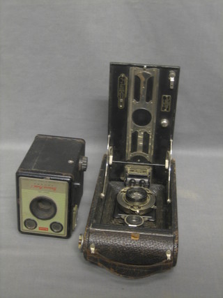 A Kodak folding camera and a box camera