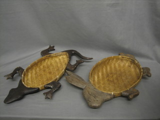 An Eastern hardwood and raffia tray in the form of a rabbit together with ditto in the form of a turtle