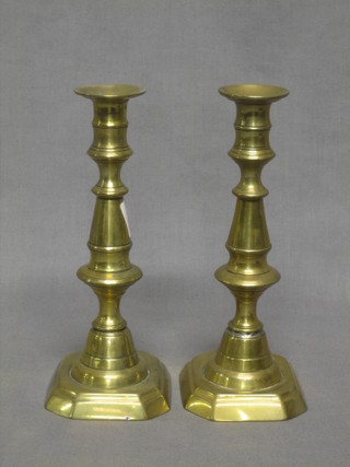 A pair of 19th Century brass candlesticks with ejectors 7"