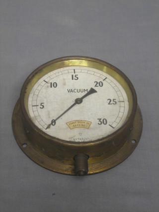 A Vacuum gauge marked Abbey Gauge Co. 6"