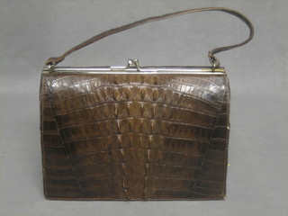 A lady's crocodile hand bag