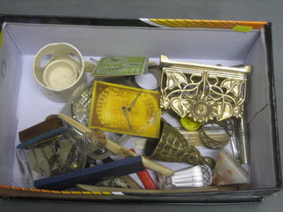 A box containing various curios etc