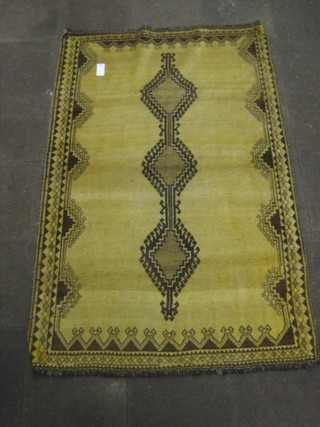 A contemporary tan ground Eyadi rug 91" x 67"