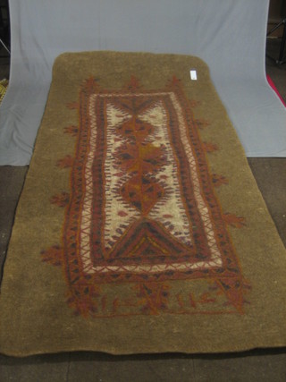 A contemporary Persian felt rug 123" x 57"