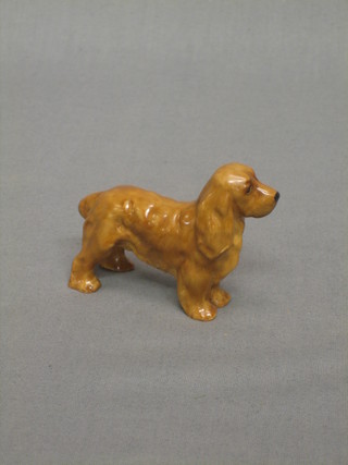 A Royal Worcester figure of a standing Spaniel, based marked 2944 2"