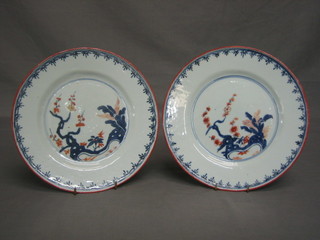 A pair of 18th Century Oriental plates decorated trees 9"