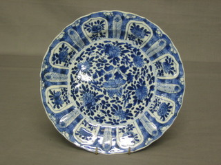 An Eastern circular blue and white floral plate with floral decoration 9" (slight chip to rim)