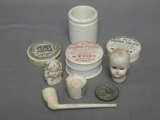 A clay pipe marked J Vining Kingston, a rum measure marked Registered January 1st 1877 1dr to lower rim, 2 Woods Aceca Nut Toothpaste pot lids, a James Atkinson pot lid (f and r), a Sainsbury's potted meat jar etc