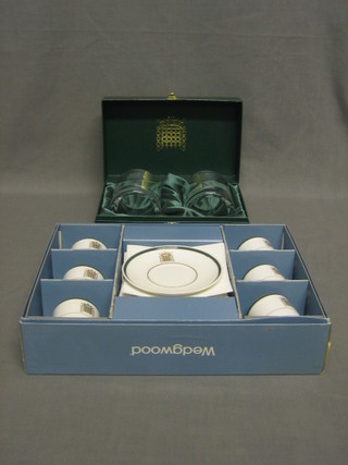 A Wedgwood 6 piece coffee service decorated The Arms of the House of Commons together with a pair of House of Commons tumblers
