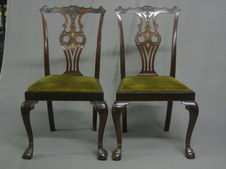 A set of 6 19th/20th Century Chippendale style mahogany slat back dining chairs with upholstered drop in seats, raised on cabriole supports