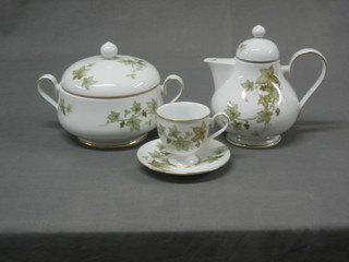 A 71 piece Noritake Island Trailing Ivy pattern tea/dinner service comprising oval meat plate 13 1/2", sauce boat and stand, 8 soup bowls 9", 15 dinner plates 10 1/2" (1 chip to rim), 16 tea plates 8", 16 tea plates 6 1/2" , teapot, sugar bowl, milk jug, 8 cups