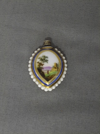 An 18th Century porcelain oval shaped scent bottle  with bead work decoration and painted panel decoration (chip to neck) 1"