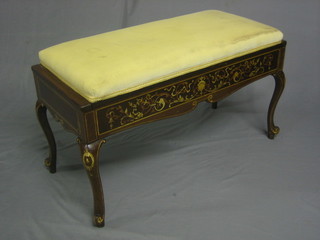 A Victorian inlaid rosewood box seat duet stool with hinged lid, raised on cabriole supports 36"