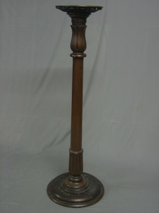 A Victorian carved mahogany bed post torchere 51"