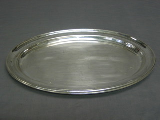 A pair of oval silver plated meat platters 16"