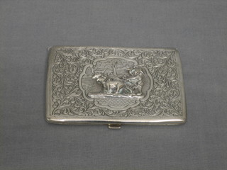 An embossed Eastern silver cigarette case decorated an ox ploughing scene 3 ozs