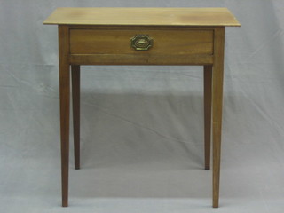 A 19/20th Century bleached mahogany side table fitted a frieze drawer, raised on square tapering supports 29"