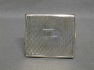 A silver cigarette case with engine turned decoration Birmingham 1959 4 ozs