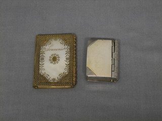 A chromium plated vesta case in the form of a book together with a gilt metal and mother of pearl Aide Memoir