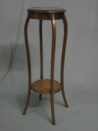 An Edwardian circular inlaid mahogany 2 tier jardiniere stand raised on cabriole supports 12"