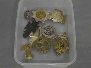 An Australian Royal Army Medical Corps cap badge, a Prince Albert's Own Yeomanry cap badge, do. 8th Irish Queens Own Regt., Middlesex Regt., 2 WWI discharge badges and 4 other cap badges