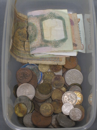 A collection of various coins and bank notes