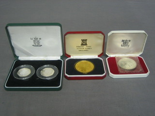 2 Isle of Man crowns and 2 1988 silver proof 50 pence pieces