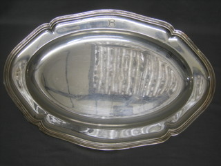 An oval Continental meat platter, the base marked Netter 950 33 ozs