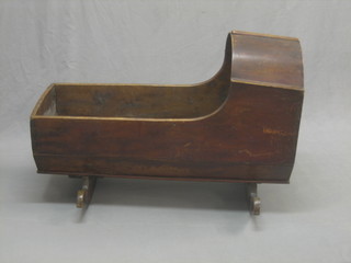 A childs 19th Century "elm" dome shaped cot 38"
