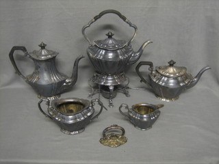 A 5 piece silver plated tea service comprising spirit kettle and burner, teapot, coffee pot, twin handled sugar bowl and cream jug together with 2 silver plated entree dish handles