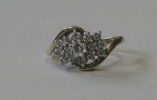 A 9ct gold cluster  ring set diamonds