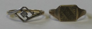 An 18ct gold dress ring set a small diamond and a 9ct gold signet ring