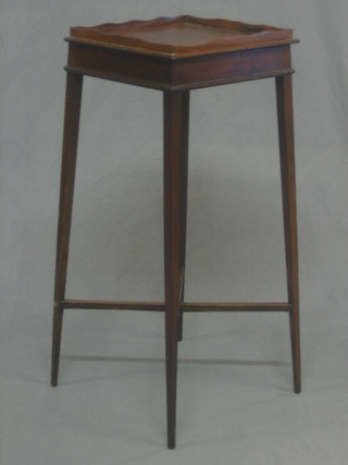 A 19th Century square urn table raised on square tapering supports with X framed stretcher 12"