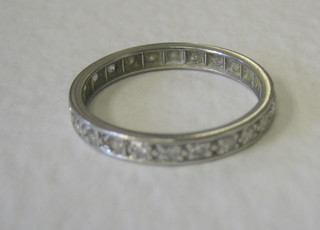 A white gold full eternity ring set diamonds