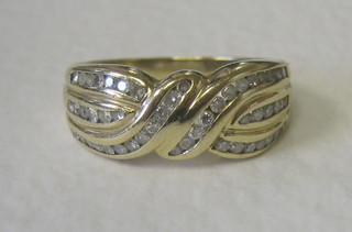 A 9ct gold dress ring set diamonds