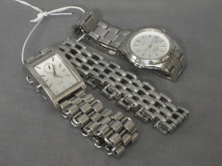 A Seiko wristwatch, a T&G wristwatch together with a heavy metal bracelet