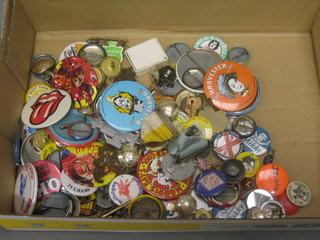 A collection of various pins, badges etc