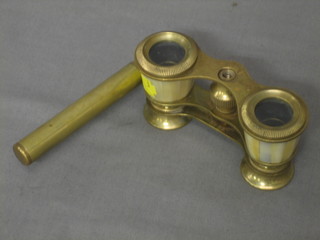 A pair of gilt metal opera glasses with mother of pearl mounts