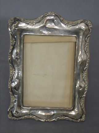 A silver easel photograph frame