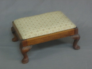 A rectangular Queen Anne style walnut stool with upholstered drop in seat raised on cabriole supports 16 1/2"