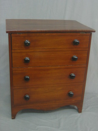 A Victorian mahogany chest commode with hinged lid raised on bracket feet  25"