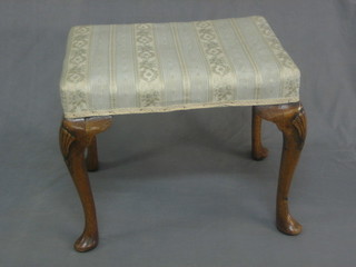 A Queen Anne style rectangular walnut dressing table stool raised on cabriole supports 21"