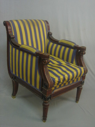 A William IV mahogany show frame armchair raised on turned supports