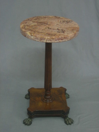 A Regency circular pink veined marble topped occasional/wine table raised on a turned column and platform base ending in hoof feet 12"