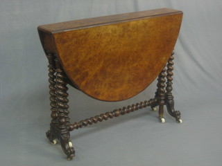 A Victorian figured walnut oval Loo table, raised on a spiral turned column 35"